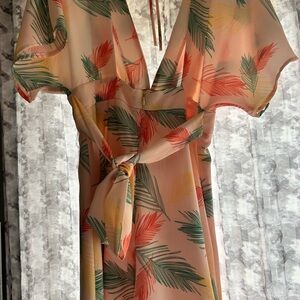 Size small low back and  front peach colored vacation dress